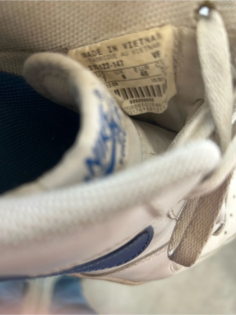 Nike White Sneakers with Blue Swoosh